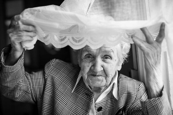 Woman sitting near window