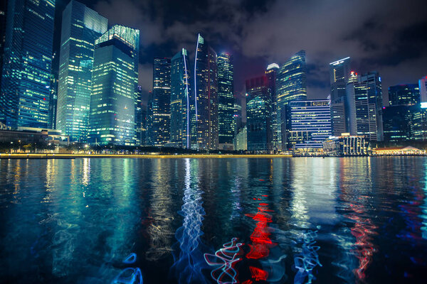 Night scene of financial district Marina Bay in Singapore.
