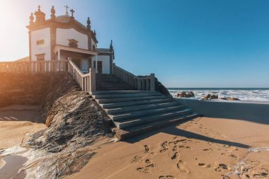Chapel Senhor da Pedra on Miramar Beach clipart