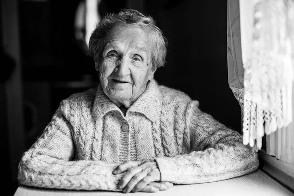 Contrast portrait of old woman. — Stock Photo, Image