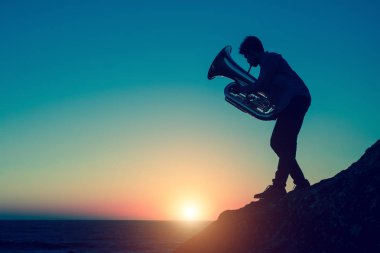musician playing the tuba clipart