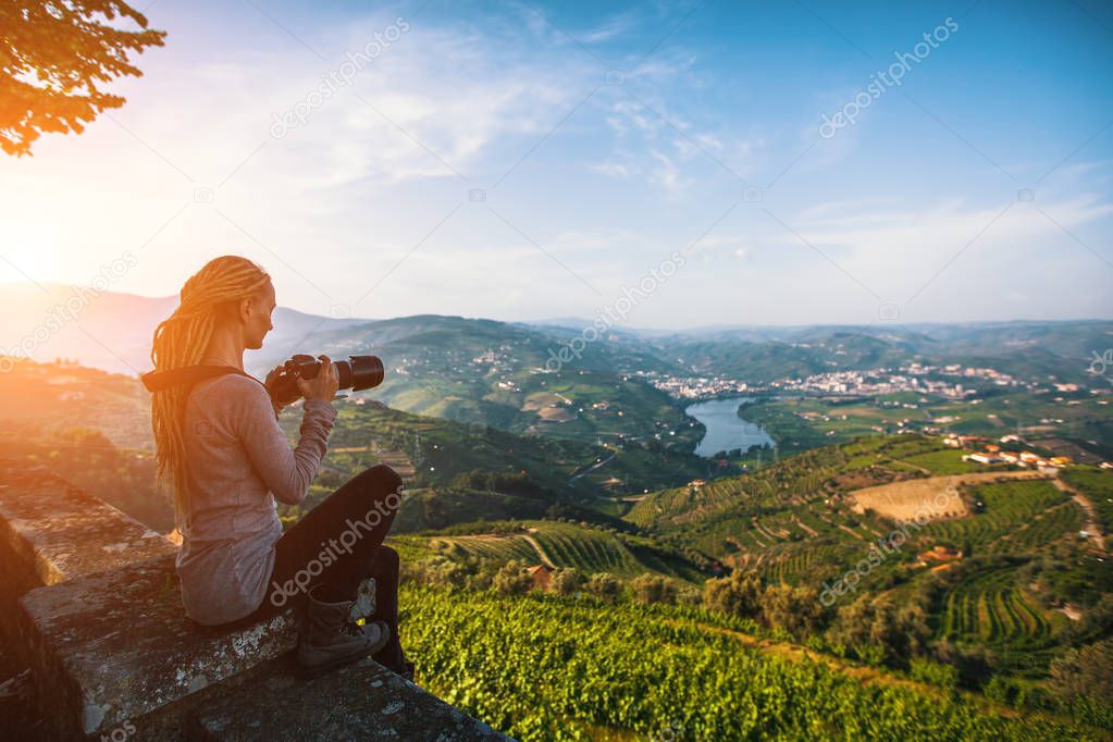woman photographs  Douro Valley