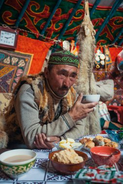 Kazakhs family of hunters clipart