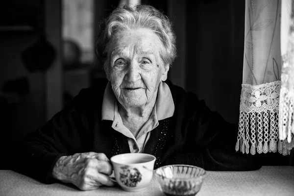 Black White Portrait Elderly Woman Drinking Tea Looking Camera — Stock Photo, Image