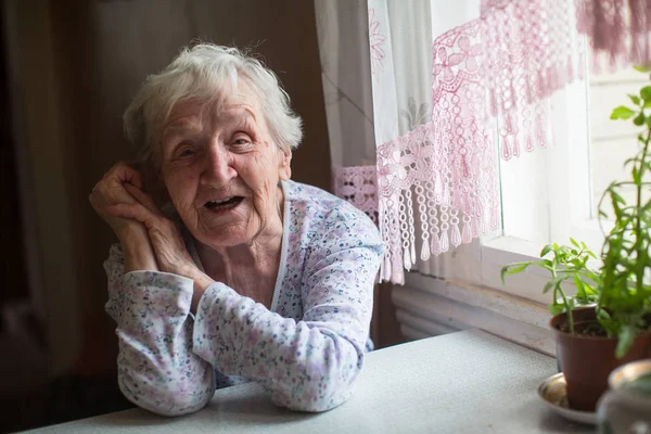 Elderly Russian Woman Sitting Table — Stock Photo, Image