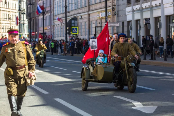 ST. PETERSBURG, RUSSIA - MAY 9, 2018: During Immortal Regiment march in the Victory Day celebrations, marking the 73rd anniversary of the victory over Nazi Germany in World War Two.