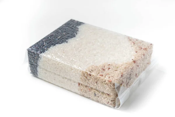 Jasmine rice and brown rice and rice berries in vacuum bag — Stock Photo, Image