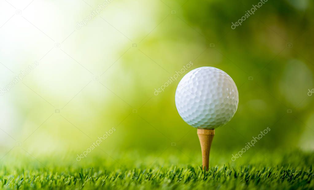 golf ball on tee ready to play
