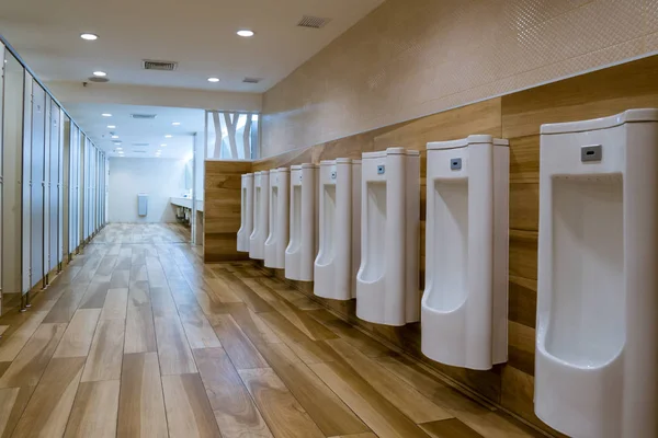 Urinal row in a public restroom — Stock Photo, Image