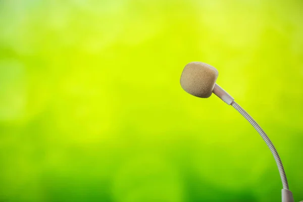 Microphone with green background — Stock Photo, Image