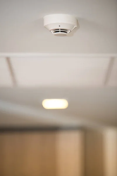 Fire alarm of fire detector on a ceiling — Stock Photo, Image