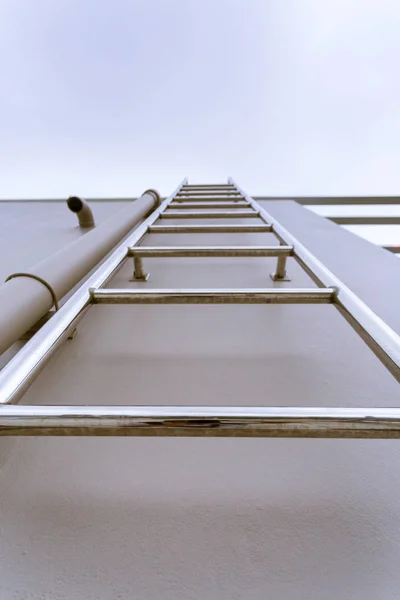 Stainless stair on rooftop of building — Stock Photo, Image