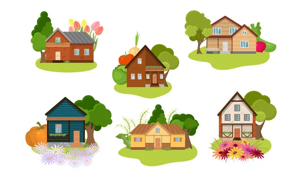 Conjunto de diferentes casas de campo com jardins. Ilustração vetorial em estilo de desenho animado plano . —  Vetores de Stock