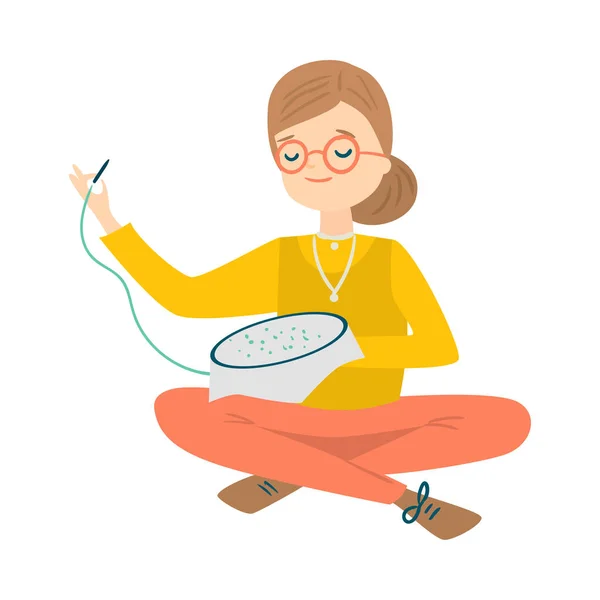 Woman sitting and cross stitching vector illustration — Stockový vektor