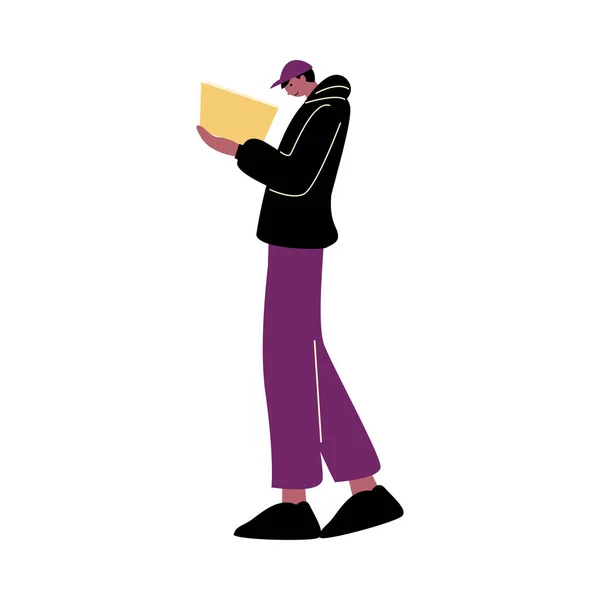 Mladý stylový muž v čepici stojící a těší čtení knihy vektorové ilustrace — Stockový vektor