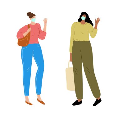 Maskeli kadınlar Coronavirüs 'ten korumak için birbirlerini uzaktan selamlıyorlar.