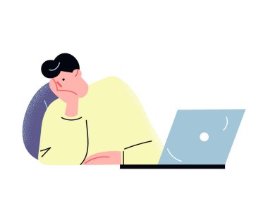 Genç adam ofiste bilgisayar çalışmaktan yoruldu.