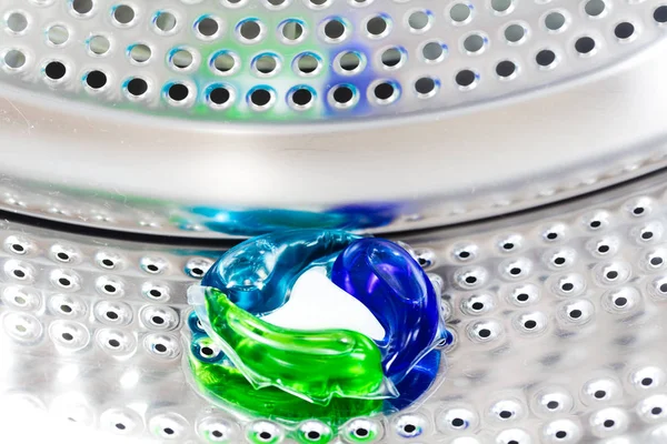 laundry detergent pod in washing machine drum