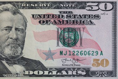 50 dolarlık banknotun parçası.