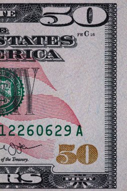 50 dolarlık banknotun parçası.