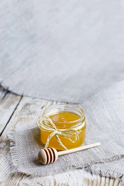 Small Glass Jar Honey Wooden Spoon Close Wooden Background Rustic — Stock Photo, Image