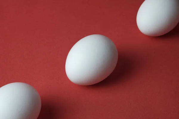 Eggs perspective line on red background