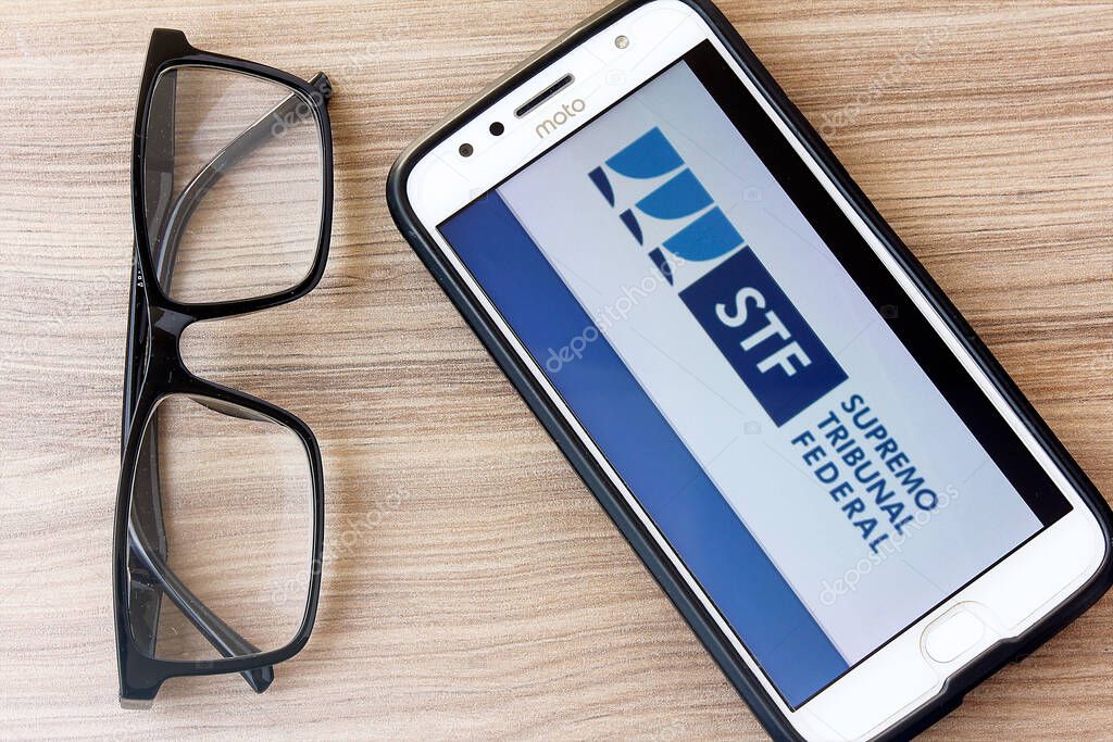 Rio de Janeiro, Brazil - February 14, 2020: Logo of the Federal Supreme Court, STF, on the smartphone screen Moto G5s Plus. It is the highest instance of the Brazilian judiciary, the supreme court.