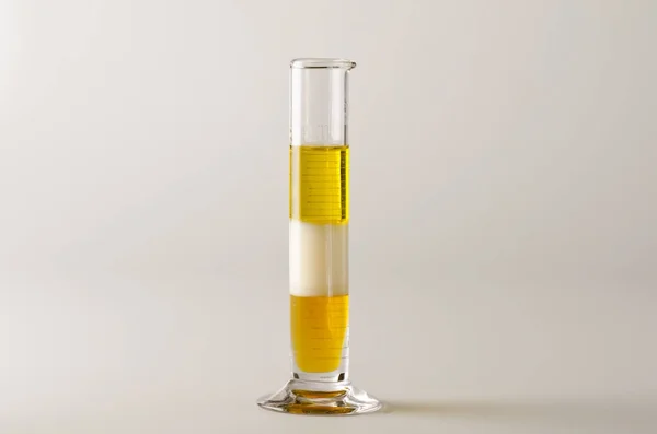 Physics. Immiscible liquids in separed layers. — Stock Photo, Image