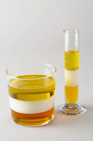 Physics. Immiscible liquids in separed layers. — Stock Photo, Image