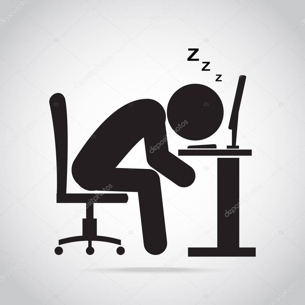 Man sleeping front of computer on work table