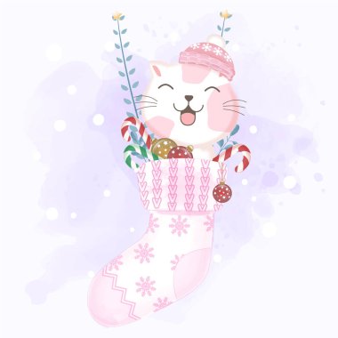 Çoraptaki kedi Noel süslemeleriyle asılı.