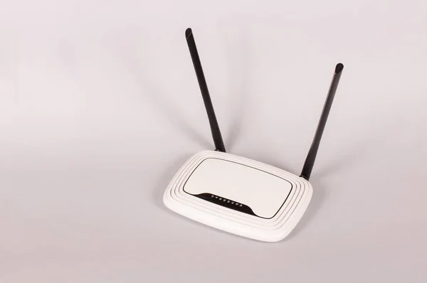 WiFi router isolated on the gray background — Stock Photo, Image