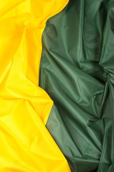 Yellow green silk fabric as background — Stock Photo, Image