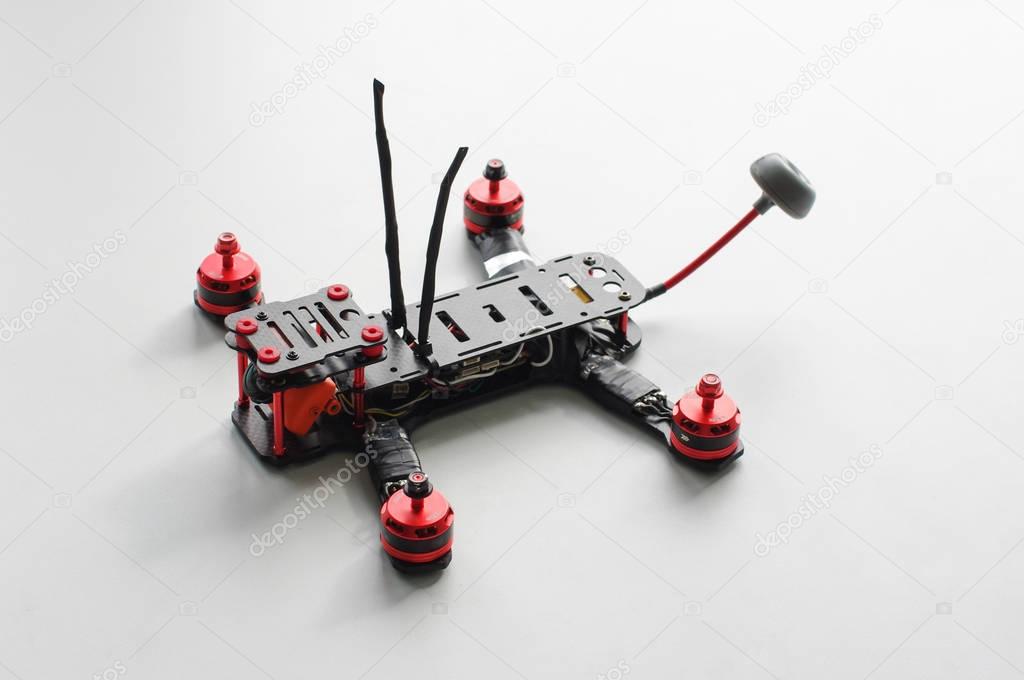 Racing quadcopter isolated on the white background
