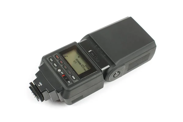 Speedligh para câmeras DSLR isoladas no fundo branco — Fotografia de Stock