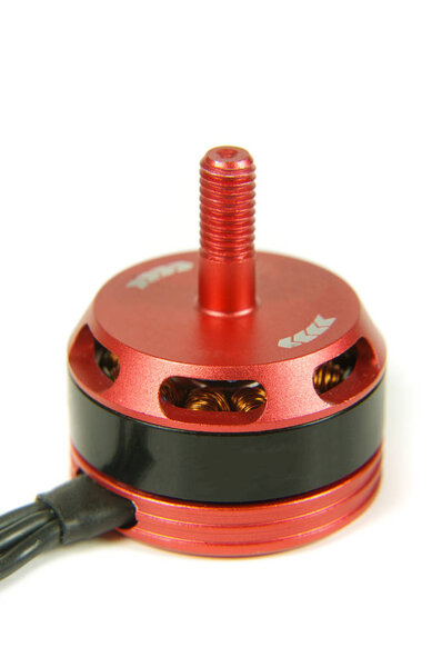 Small brushless motor for racing drones on the white background
