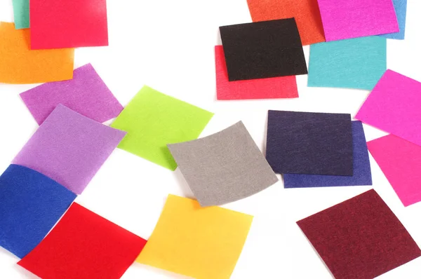 Olika färger fyrkantig kände prover för textildesign — Stockfoto