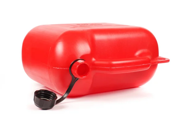 Червона пластикова бензинова каністра — стокове фото