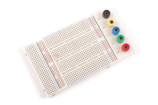 Empty breadboard for electronics prototyping isolated on the whi — Stock Photo, Image