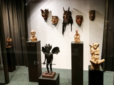 KAUNAS, LITHUANIA - APRIL 08, 2015: Symbolic devil sculpture artwork in the Zmuidzinavicius Devils Museum in Kaunas Lithuania