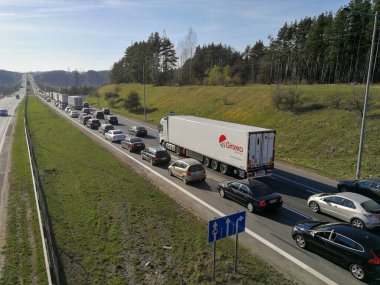 KAUNAS, LITHUANIA - MARCH 19, 2019: Traffic jam close to Kleboniskis forest bridge under construction