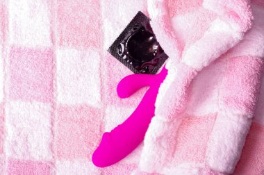 Pink color dildo vibrator. Adult sex toy with G-spot simulation