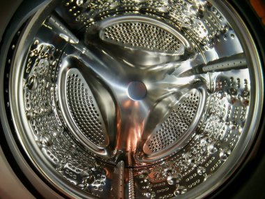 Çamaşır makinesi davulu. İç görünümü delik.