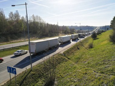 KAUNAS, LITHUANIA - MARCH 19, 2019: Traffic jam close to Kleboniskis forest bridge under construction