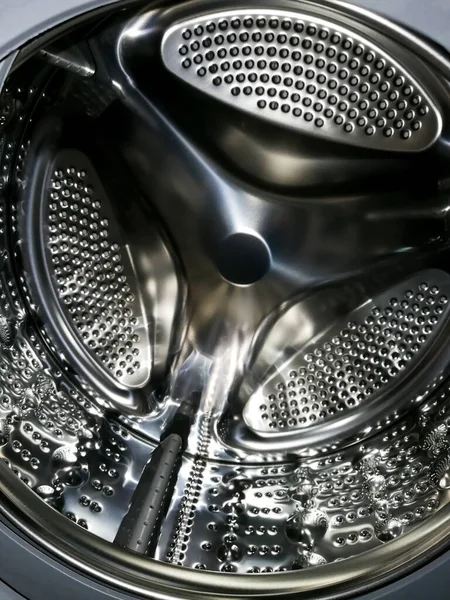 多くの穴内部ビューを持つ洗濯機ドラム — ストック写真