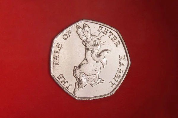 Coin Dedicated Beatrix Potter Tale Peter Rabit Pence Isolated Red — Stock Photo, Image