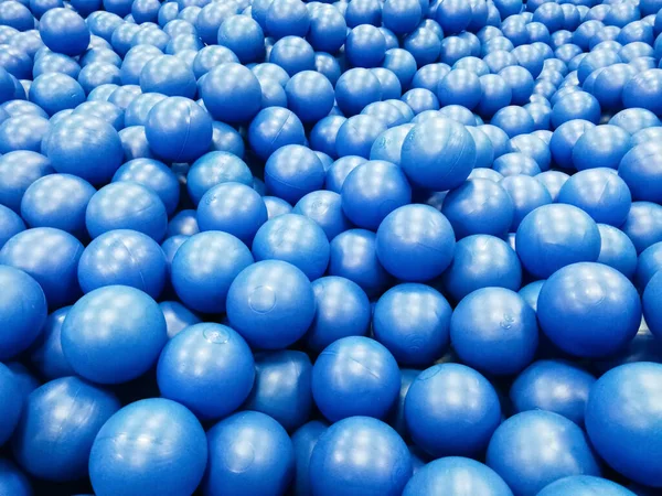 Many blue balls for childrens to play in the pool