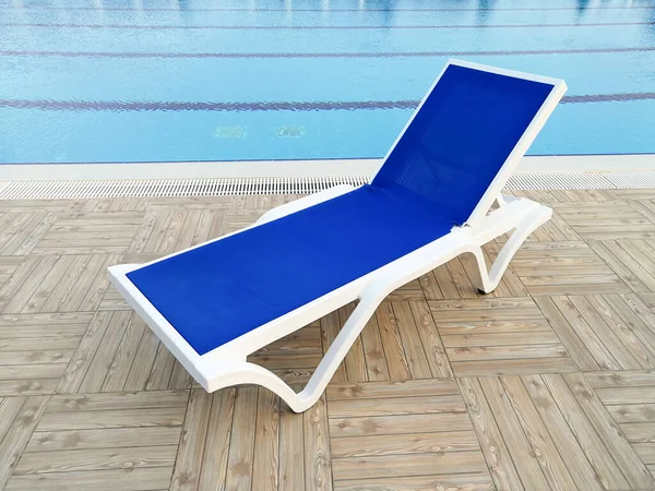 Plastic sun lounger near the swiming pool, holidays concept