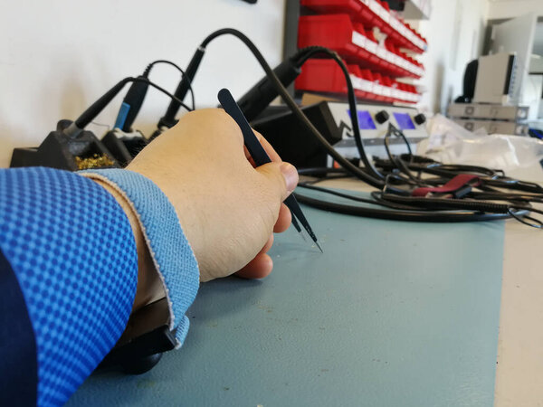 Engineer hand with elekctrostatic protection wristband