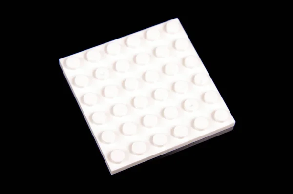 Macro Close Constructor Toy White Flat Plastic Brick Isolated Black — Stock Photo, Image